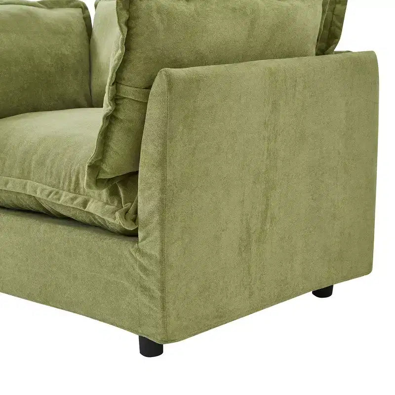 Fauteuil en tissu chenille avec pouf mobile, assise large et accoudoirs incurvés