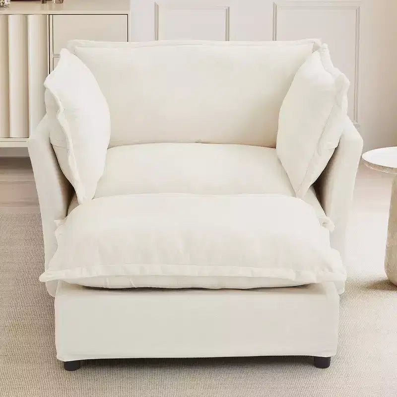 Fauteuil en tissu chenille avec pouf mobile, assise large et accoudoirs incurvés