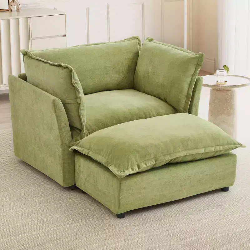 Fauteuil en tissu chenille avec pouf mobile, assise large et accoudoirs incurvés