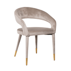 Chaise de salle à manger incurvée en velours taupe avec découpes et pieds dorés