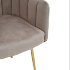 Chaise de salle à manger festonnée en velours beige avec pieds coniques dorés
